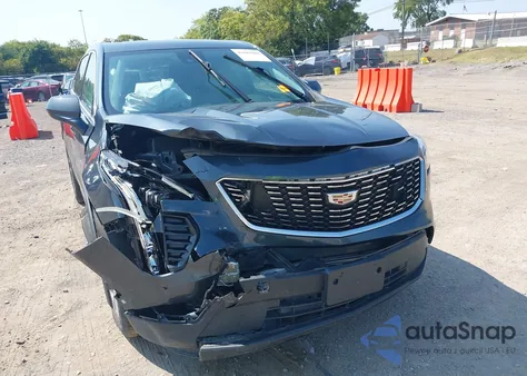 2021 Cadillac Xt4 Awd Luxury z USA, uszkodzony, nr VIN 1GYFZBR43MF001738